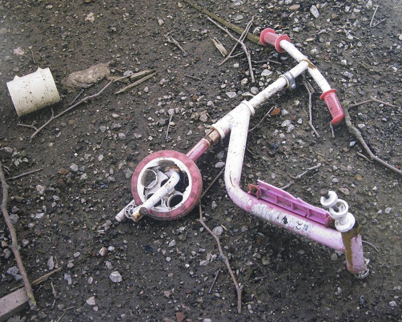 Discarded pink scooter in Salford. Photograph by Shirley Baker