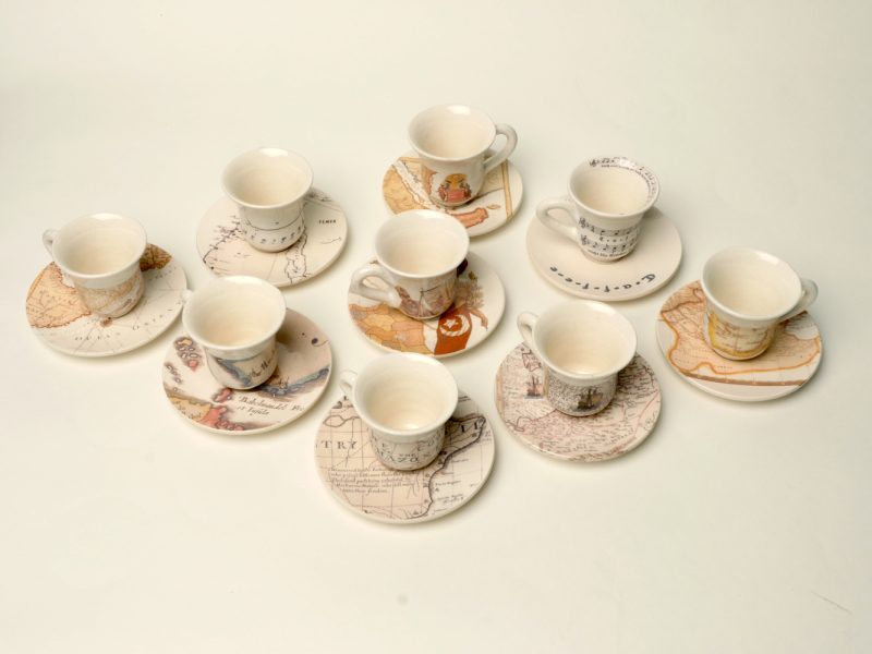 photograph of Turkish style coffee cups imprinted with maps