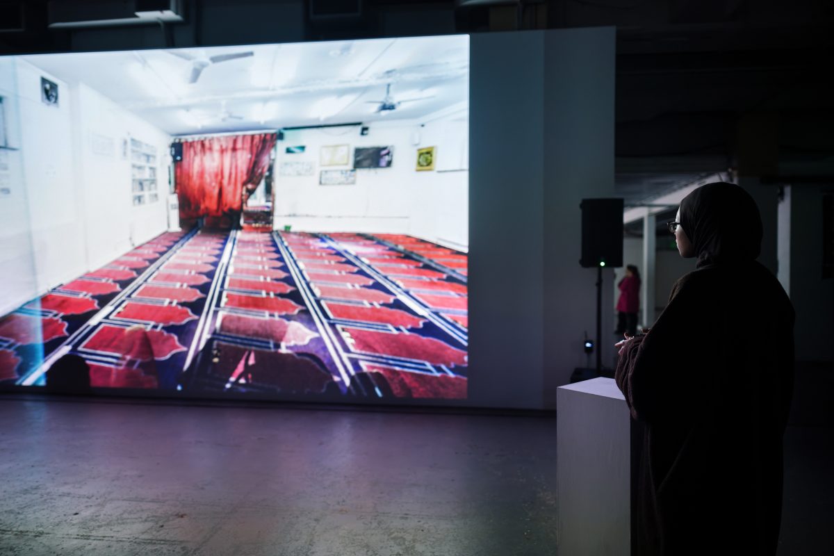 Person interacting with 3d model from Virtual Assembly work by Julie Marsh