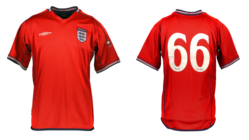 Umbro football away shirt, red with white and dark navy detail, front and back.