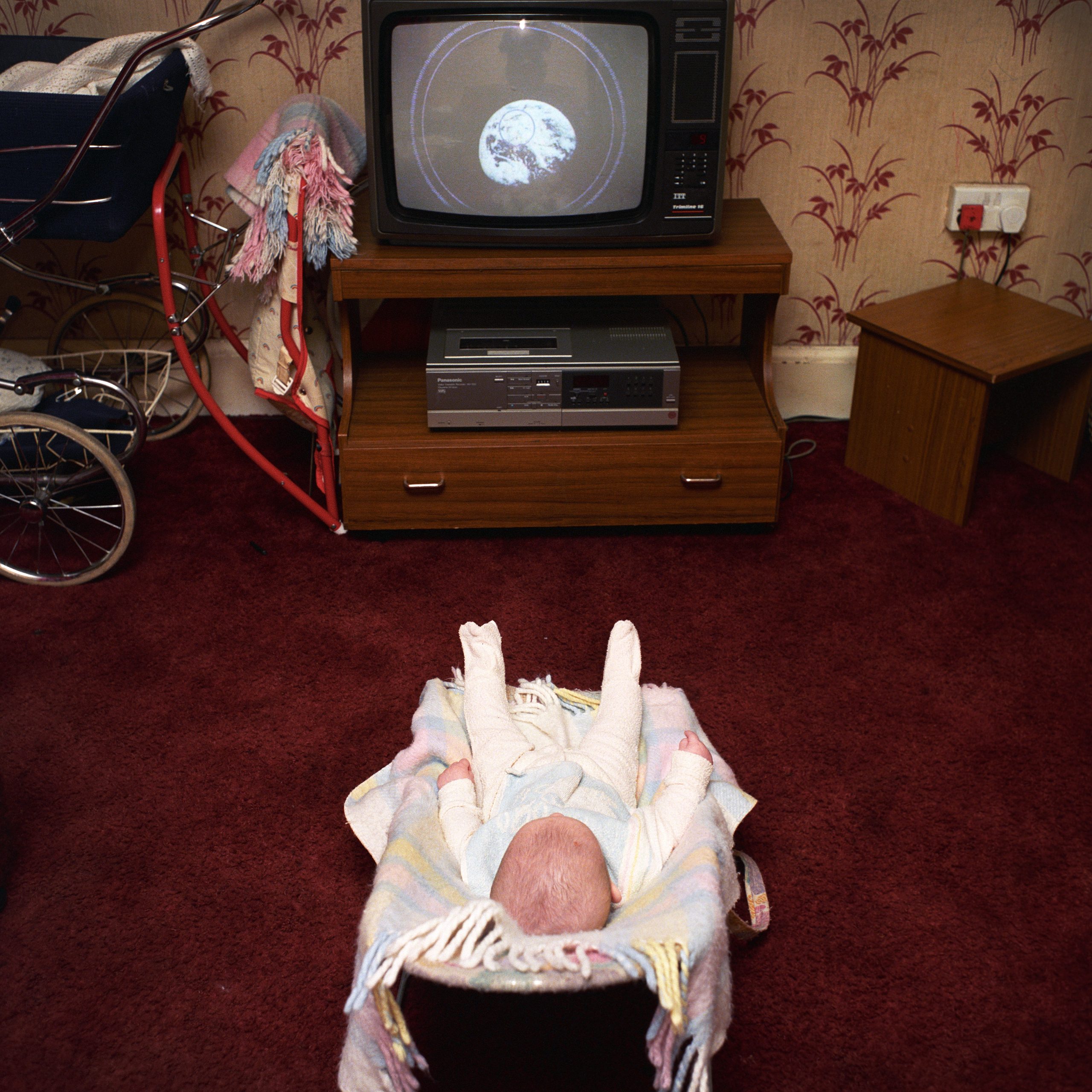 'Baby, TV, Earth' by David Moore